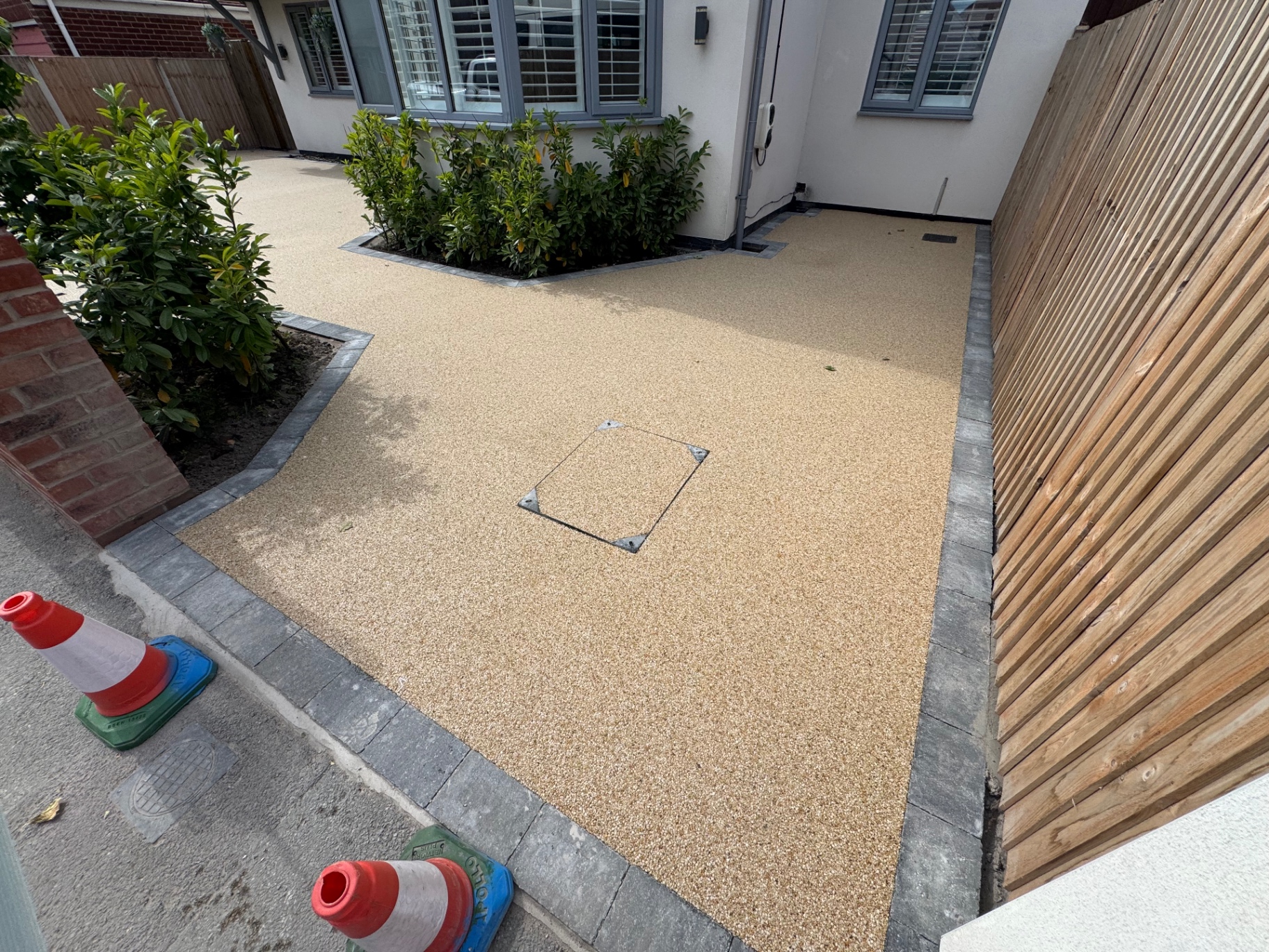 Resin pathway with shrub borders